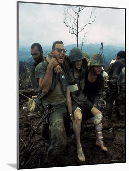 American Marines Aid a Wounded Comrade During Intense Battle for Hill 484-Larry Burrows-Mounted Photographic Print