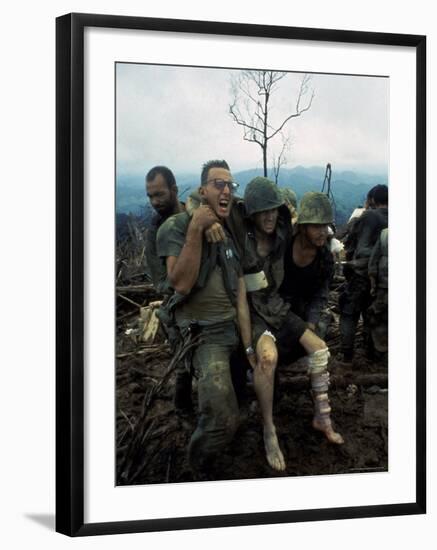 American Marines Aid a Wounded Comrade During Intense Battle for Hill 484-Larry Burrows-Framed Photographic Print