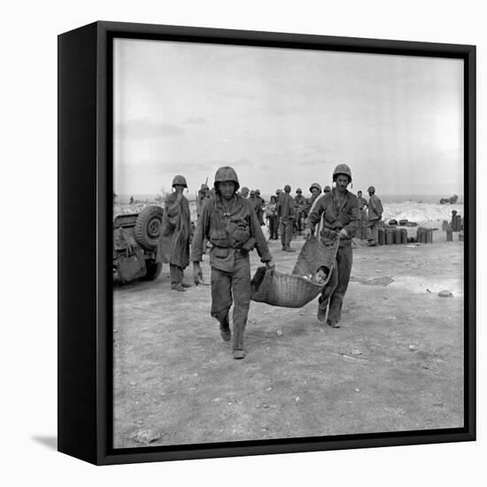 American Marines Carrying a Wounded Child to an Aid Station after the Invasion of Saipan-Peter Stackpole-Framed Premier Image Canvas