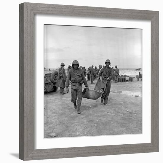 American Marines Carrying a Wounded Child to an Aid Station after the Invasion of Saipan-Peter Stackpole-Framed Photographic Print