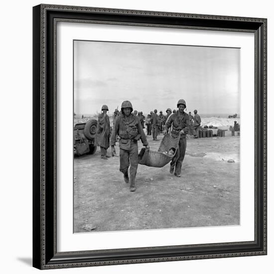 American Marines Carrying a Wounded Child to an Aid Station after the Invasion of Saipan-Peter Stackpole-Framed Photographic Print