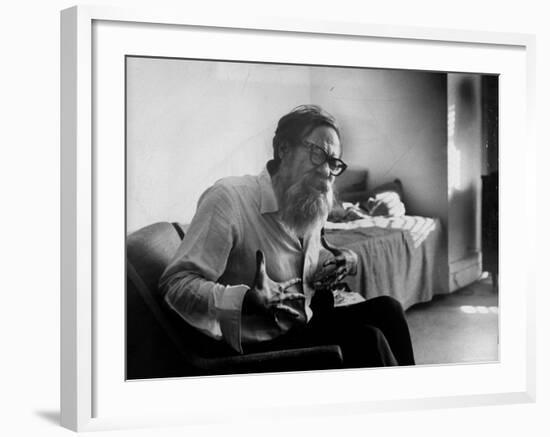 American Poet John Berryman Expressing Himself While Sitting in His Semi Empty Apartment-Mark Kauffman-Framed Premium Photographic Print