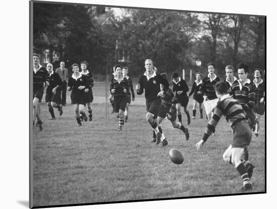 American Rhodes Scholar Peter Dawkins Playing Rugby with Fellow Oxford Univ. Students-null-Mounted Photographic Print