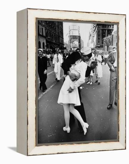 American Sailor Clutching a White-Uniformed Nurse in a Passionate Kiss in Times Square-Alfred Eisenstaedt-Framed Premier Image Canvas