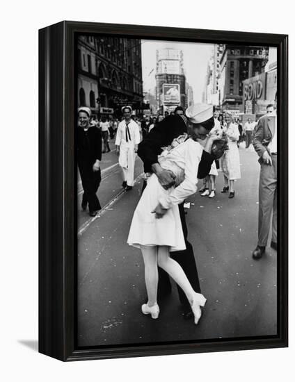 American Sailor Clutching a White-Uniformed Nurse in a Passionate Kiss in Times Square-Alfred Eisenstaedt-Framed Premier Image Canvas