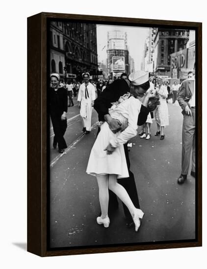 American Sailor Clutching a White-Uniformed Nurse in a Passionate Kiss in Times Square-Alfred Eisenstaedt-Framed Premier Image Canvas