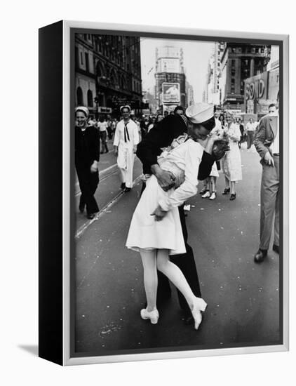 American Sailor Clutching a White-Uniformed Nurse in a Passionate Kiss in Times Square-Alfred Eisenstaedt-Framed Premier Image Canvas