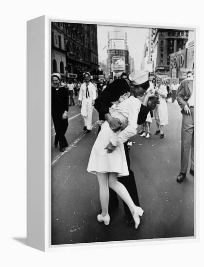 American Sailor Clutching a White-Uniformed Nurse in a Passionate Kiss in Times Square-Alfred Eisenstaedt-Framed Premier Image Canvas