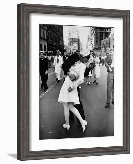 American Sailor Clutching a White-Uniformed Nurse in a Passionate Kiss in Times Square-Alfred Eisenstaedt-Framed Photographic Print