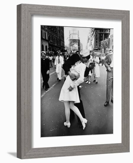 American Sailor Clutching a White-Uniformed Nurse in a Passionate Kiss in Times Square-Alfred Eisenstaedt-Framed Photographic Print