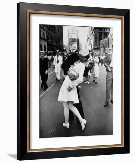 American Sailor Clutching a White-Uniformed Nurse in a Passionate Kiss in Times Square-Alfred Eisenstaedt-Framed Photographic Print