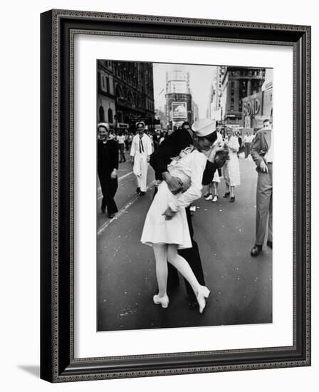 American Sailor Clutching a White-Uniformed Nurse in a Passionate Kiss in Times Square-Alfred Eisenstaedt-Framed Photographic Print