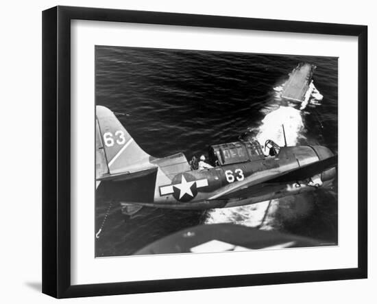 American SB2C Scout Plane Circling Above an Aircraft Carrier Prior to Landing-null-Framed Photographic Print