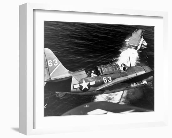 American SB2C Scout Plane Circling Above an Aircraft Carrier Prior to Landing-null-Framed Photographic Print