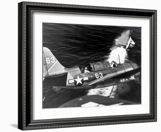 American SB2C Scout Plane Circling Above an Aircraft Carrier Prior to Landing-null-Framed Photographic Print