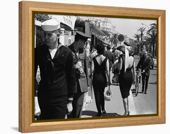 American Serviceman Admiring Two Female Pedestrians at the Cannes Film Festival-Paul Schutzer-Framed Premier Image Canvas