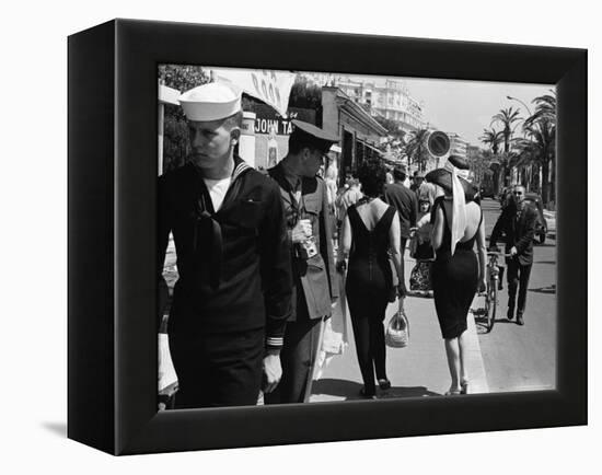 American Serviceman Admiring Two Female Pedestrians at the Cannes Film Festival-Paul Schutzer-Framed Premier Image Canvas