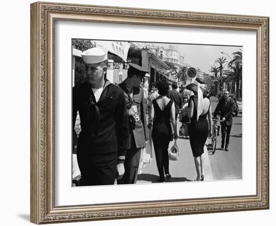 American Serviceman Admiring Two Female Pedestrians at the Cannes Film Festival-Paul Schutzer-Framed Photographic Print
