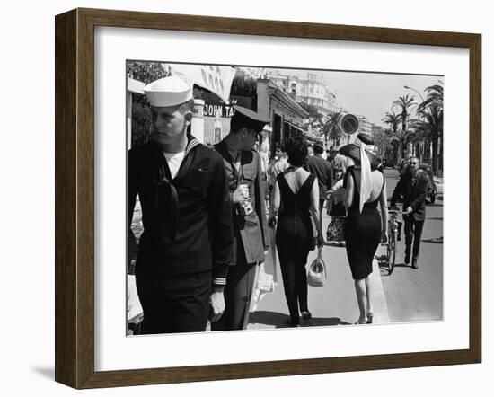 American Serviceman Admiring Two Female Pedestrians at the Cannes Film Festival-Paul Schutzer-Framed Photographic Print