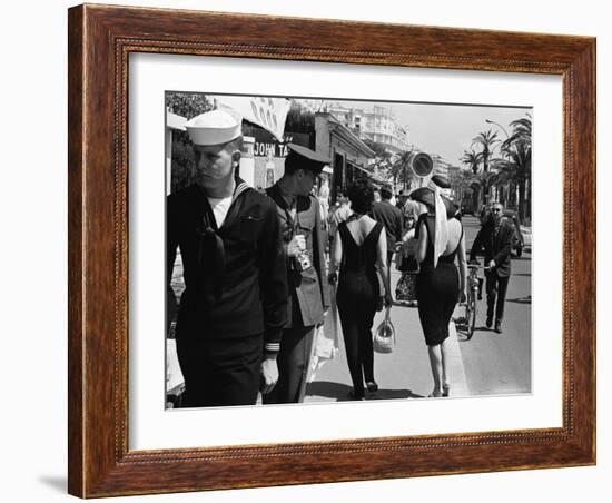 American Serviceman Admiring Two Female Pedestrians at the Cannes Film Festival-Paul Schutzer-Framed Photographic Print