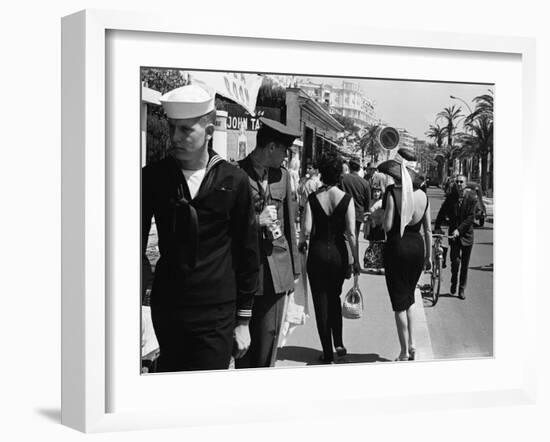 American Serviceman Admiring Two Female Pedestrians at the Cannes Film Festival-Paul Schutzer-Framed Photographic Print