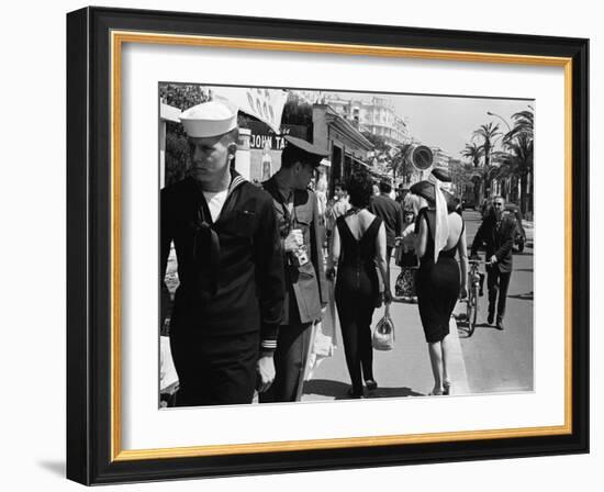 American Serviceman Admiring Two Female Pedestrians at the Cannes Film Festival-Paul Schutzer-Framed Photographic Print