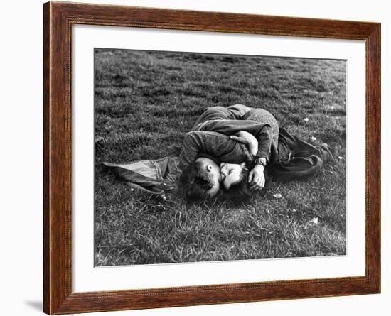 American Soldier and English Girlfriend Blissfully Embracing on Lawn in Hyde Park-Ralph Morse-Framed Photographic Print