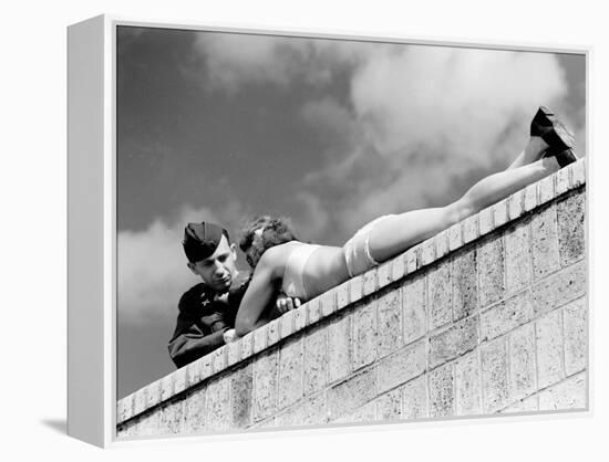 American Soldier Chatting with a Sunbathing German Girl in Postwar Berlin-Margaret Bourke-White-Framed Premier Image Canvas