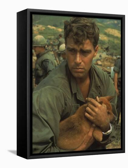 American Soldier Cradling Dog While under Siege at Khe Sanh-Larry Burrows-Framed Premier Image Canvas