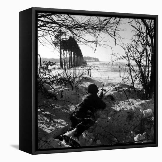 American Soldier Peering Across Snowy Field During Counter Offensive Known as Battle of the Bulge-John Florea-Framed Premier Image Canvas