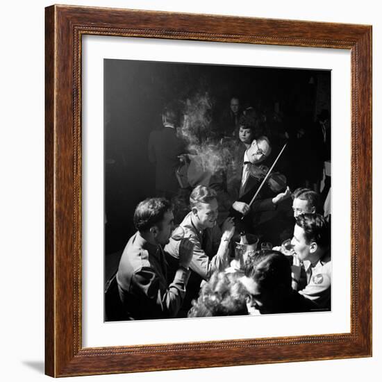 American Soldiers Drinking Champagne and Listening to Violinist at Nightclub "La Parisana."-George Silk-Framed Photographic Print