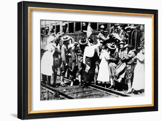 American Soldiers of the 62nd Regiment Kiss the Girls Goodbye as They Leave for Europe, August 1917-American Photographer-Framed Photographic Print