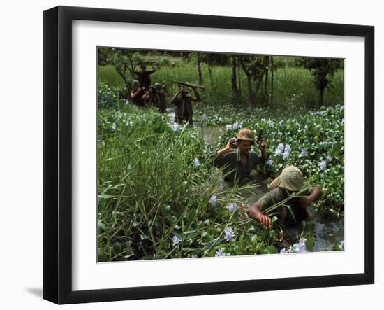 American Soldiers Wade Through Marshy Area During the Vietnam War-Paul Schutzer-Framed Photographic Print