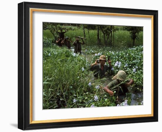 American Soldiers Wade Through Marshy Area During the Vietnam War-Paul Schutzer-Framed Photographic Print