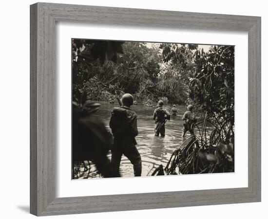 American Soldiers Wading Through Water in the New Georgia Group of the Solomon Islands, 1943-null-Framed Photo