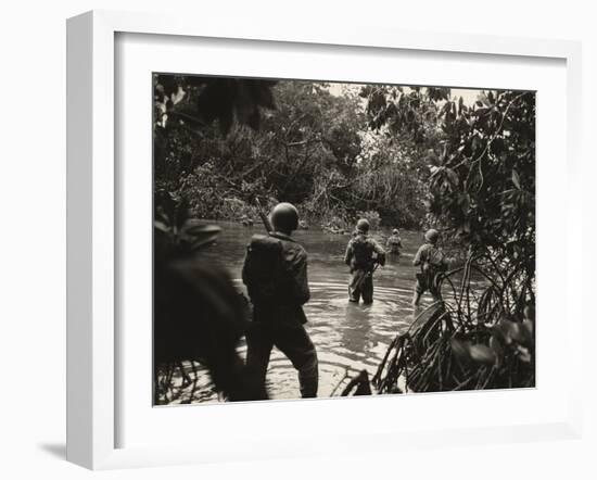 American Soldiers Wading Through Water in the New Georgia Group of the Solomon Islands, 1943-null-Framed Photo