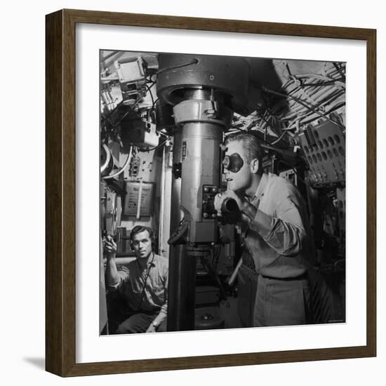 American Submarine Captain Peering Through Ship's Periscope Searching for Japanese Shipping-null-Framed Photographic Print