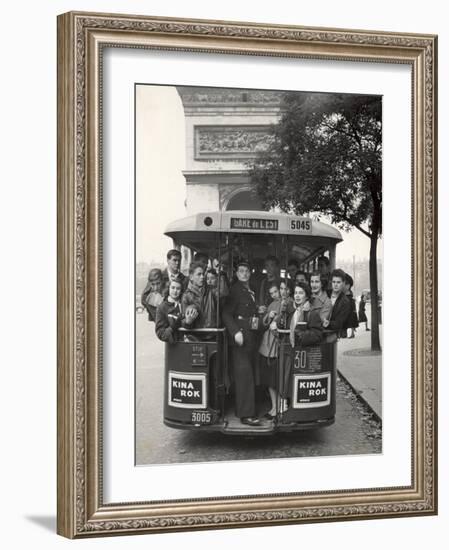 American Teenagers Riding Streetcar Towards Arc de Triomphe, Head Home-Gordon Parks-Framed Photographic Print