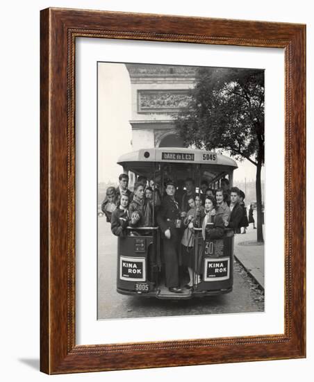 American Teenagers Riding Streetcar Towards Arc de Triomphe, Head Home-Gordon Parks-Framed Photographic Print