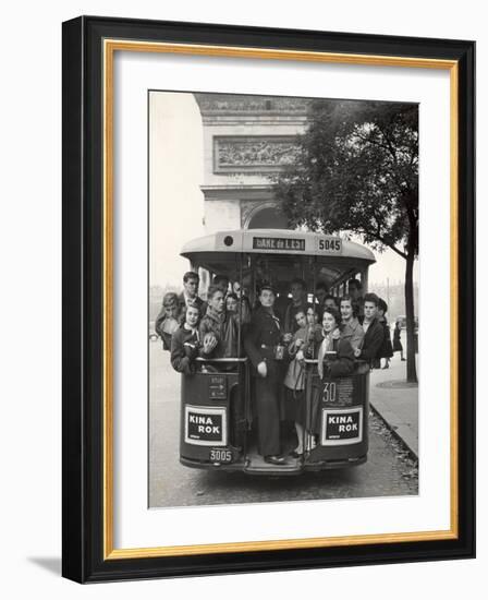 American Teenagers Riding Streetcar Towards Arc de Triomphe, Head Home-Gordon Parks-Framed Photographic Print