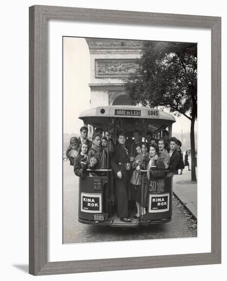 American Teenagers Riding Streetcar Towards Arc de Triomphe, Head Home-Gordon Parks-Framed Photographic Print