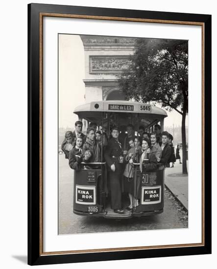 American Teenagers Riding Streetcar Towards Arc de Triomphe, Head Home-Gordon Parks-Framed Photographic Print