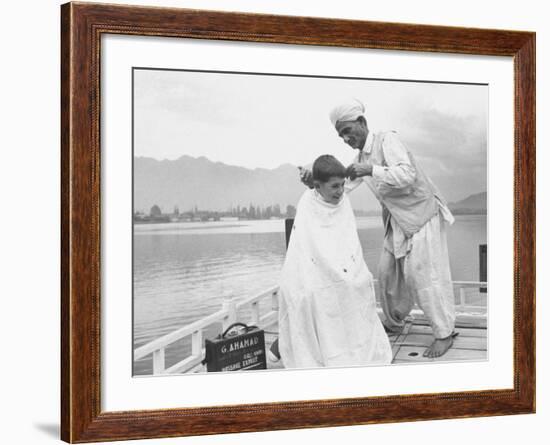 American Tourist, Young Danny Thomas Receiving Hair Cut on House Boat During Vacationing-James Burke-Framed Photographic Print