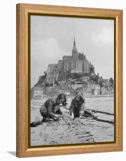 American Travelers Building a Sand Replica of France's Medieval Abbey at Mont Saint Michel-Yale Joel-Framed Premier Image Canvas