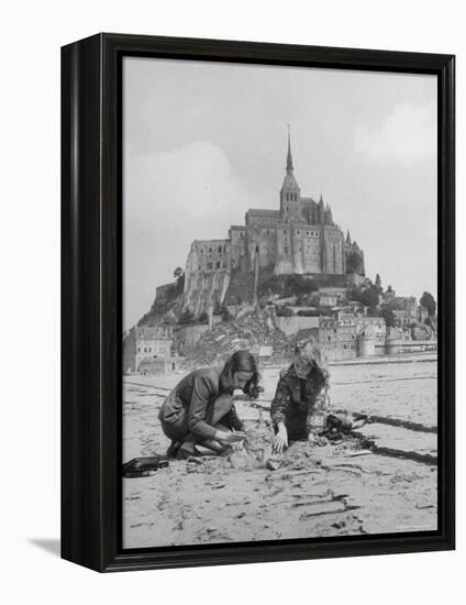 American Travelers Building a Sand Replica of France's Medieval Abbey at Mont Saint Michel-Yale Joel-Framed Premier Image Canvas
