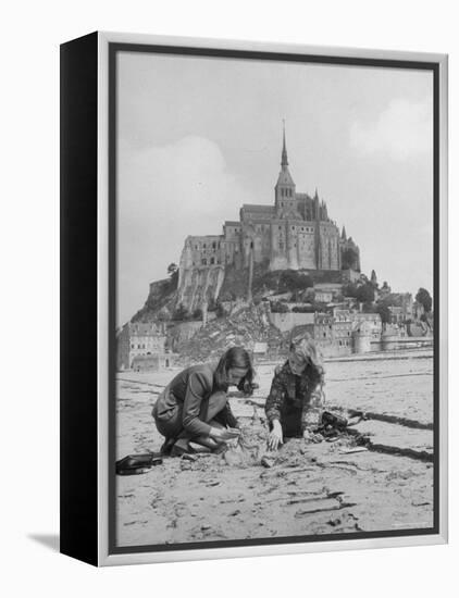 American Travelers Building a Sand Replica of France's Medieval Abbey at Mont Saint Michel-Yale Joel-Framed Premier Image Canvas