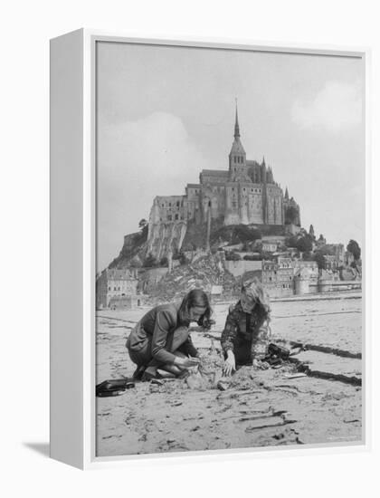 American Travelers Building a Sand Replica of France's Medieval Abbey at Mont Saint Michel-Yale Joel-Framed Premier Image Canvas