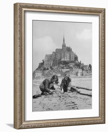 American Travelers Building a Sand Replica of France's Medieval Abbey at Mont Saint Michel-Yale Joel-Framed Photographic Print