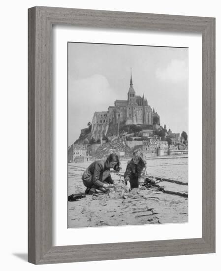 American Travelers Building a Sand Replica of France's Medieval Abbey at Mont Saint Michel-Yale Joel-Framed Photographic Print