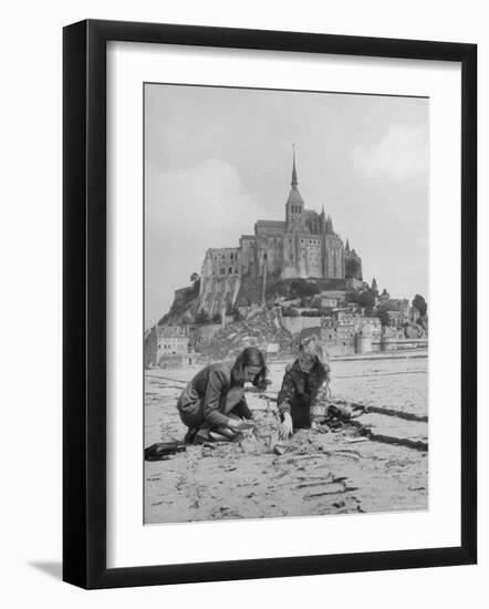 American Travelers Building a Sand Replica of France's Medieval Abbey at Mont Saint Michel-Yale Joel-Framed Photographic Print